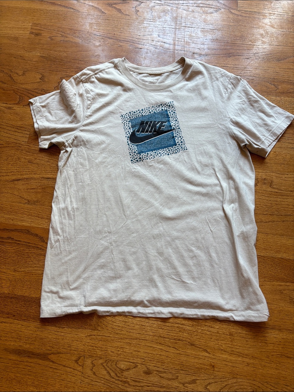 Nike Men's Cream T-Shirt with Blue Logo Patch